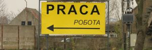Napis "praca" po polsku i ukraińsku.